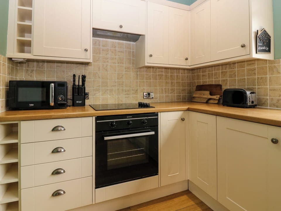 Fridge, dishwasher, electric kettle, cookware/dishes/utensils