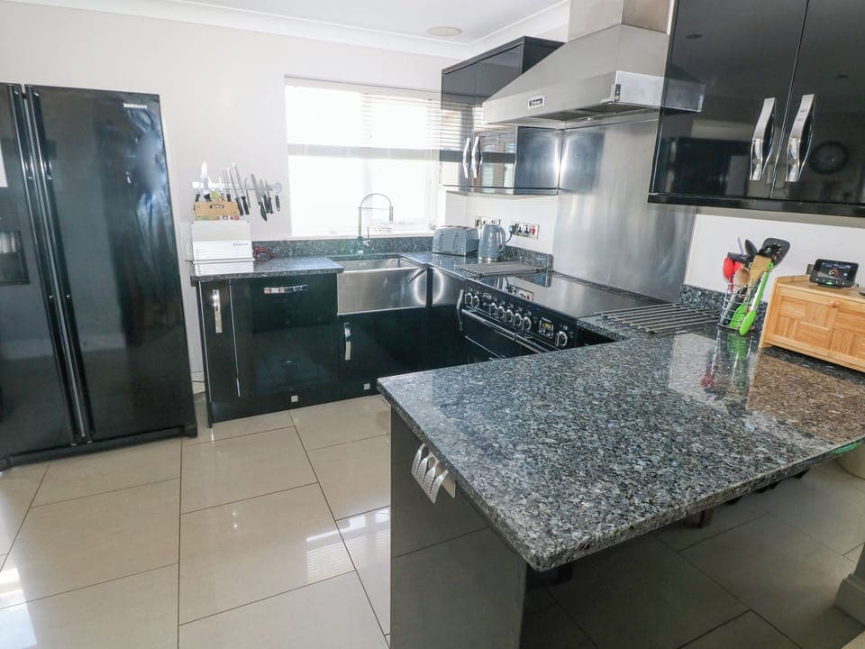 Fridge, dishwasher, electric kettle, cookware/dishes/utensils