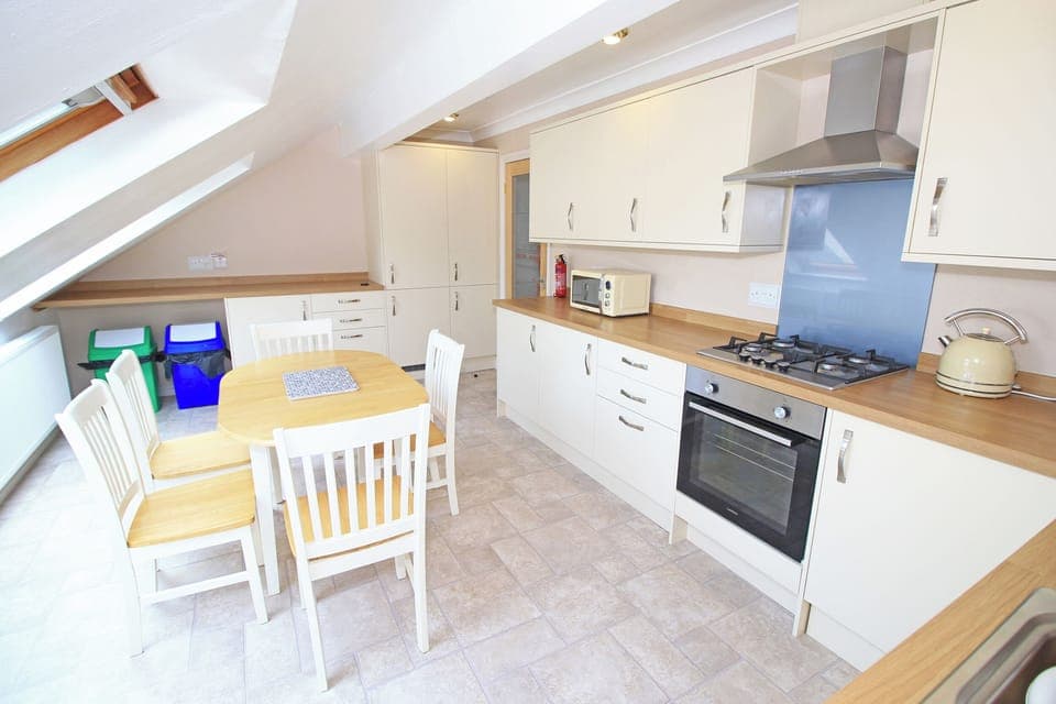 Fridge, dishwasher, electric kettle, cookware/dishes/utensils