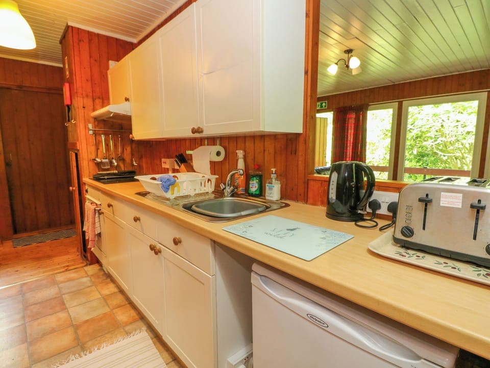 Fridge, electric kettle, toaster, cookware/dishes/utensils