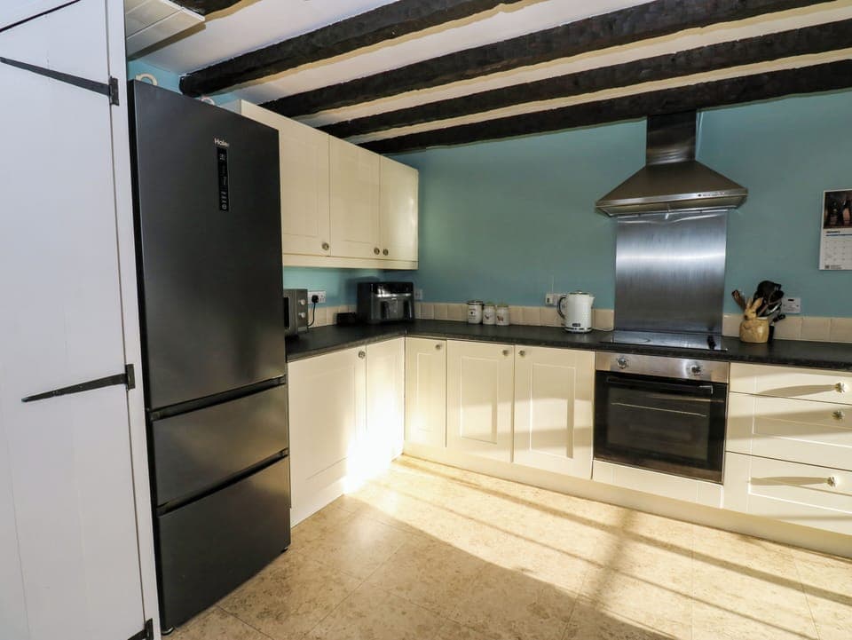 Fridge, dishwasher, electric kettle, cookware/dishes/utensils