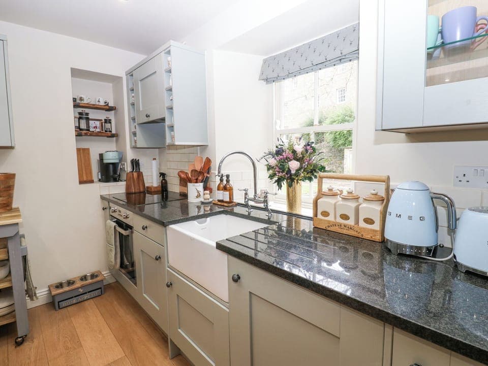 Fridge, electric kettle, cookware/dishes/utensils