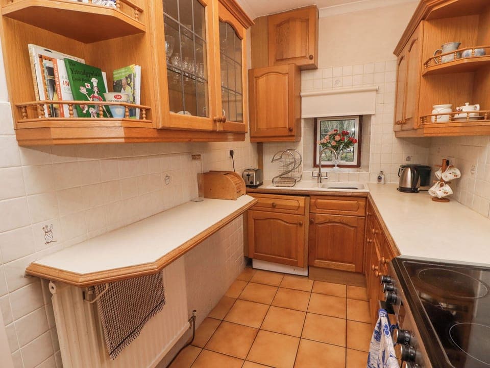 Fridge, electric kettle, cookware/dishes/utensils