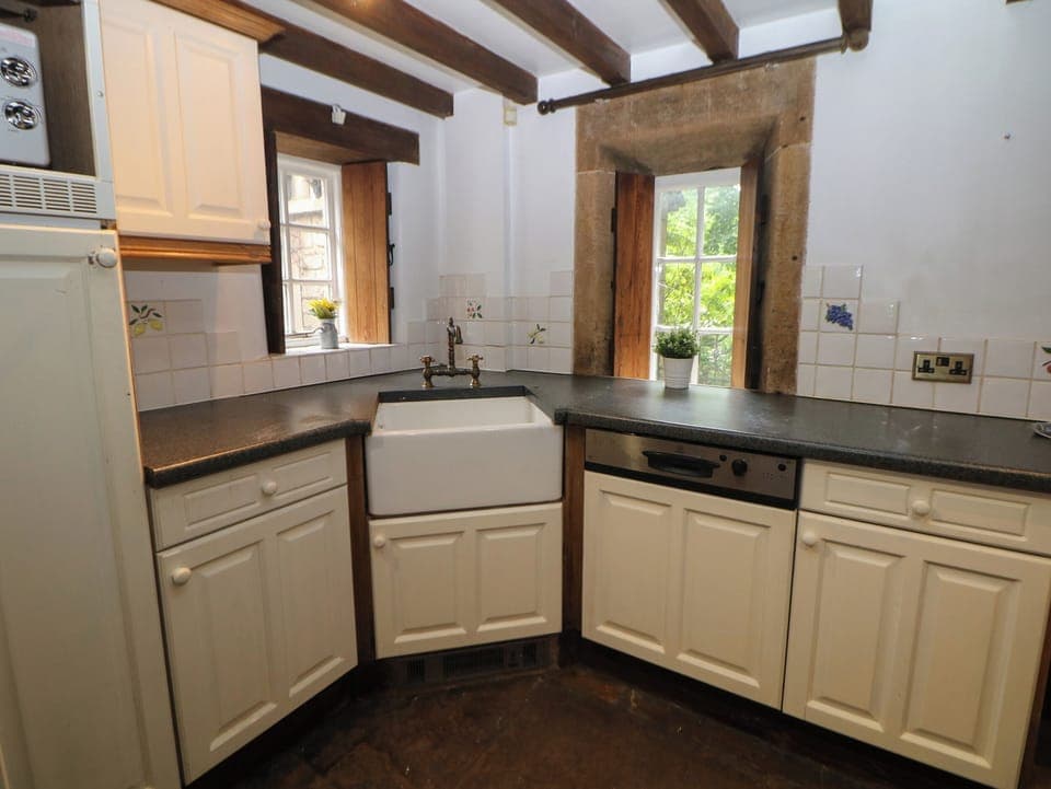 Fridge, electric kettle, cookware/dishes/utensils