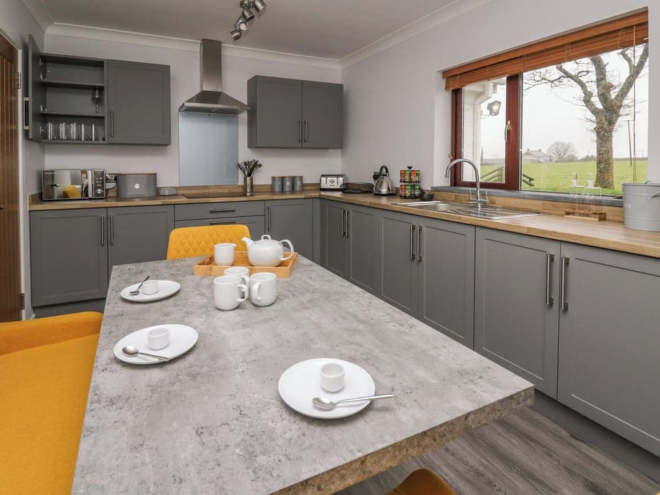 Fridge, electric kettle, toaster, cookware/dishes/utensils