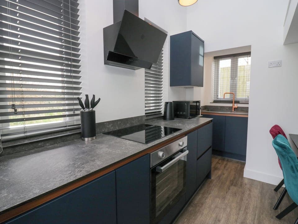 Fridge, electric kettle, toaster, cookware/dishes/utensils