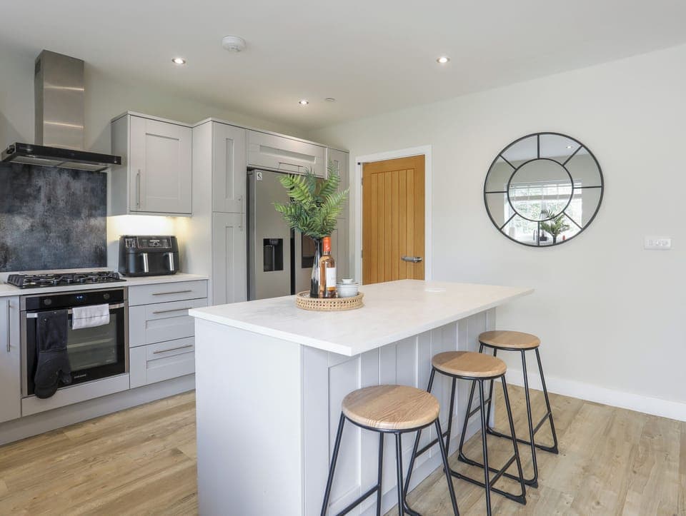 Fridge, electric kettle, toaster, cookware/dishes/utensils