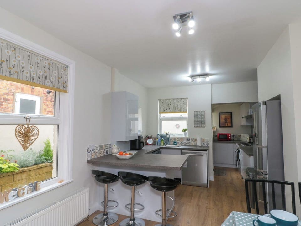 Fridge, dishwasher, electric kettle, cookware/dishes/utensils