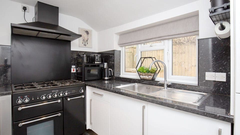 The kitchen is compact with everything you need to cook up a storm