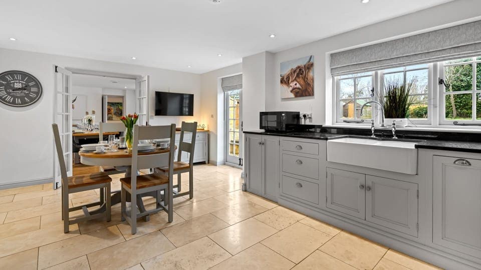 The kitchen has a breakfast table for a quick meal