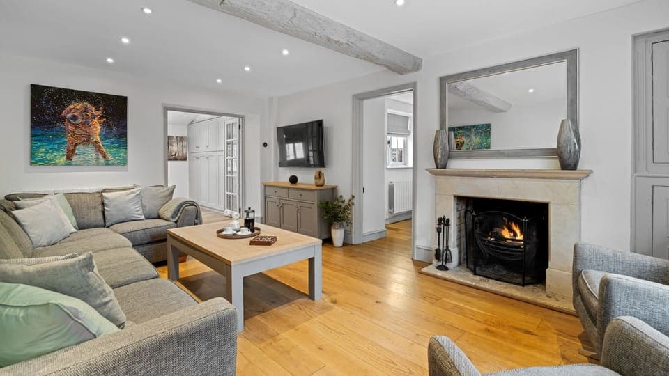 Light the fire and gather in the elegant sitting room