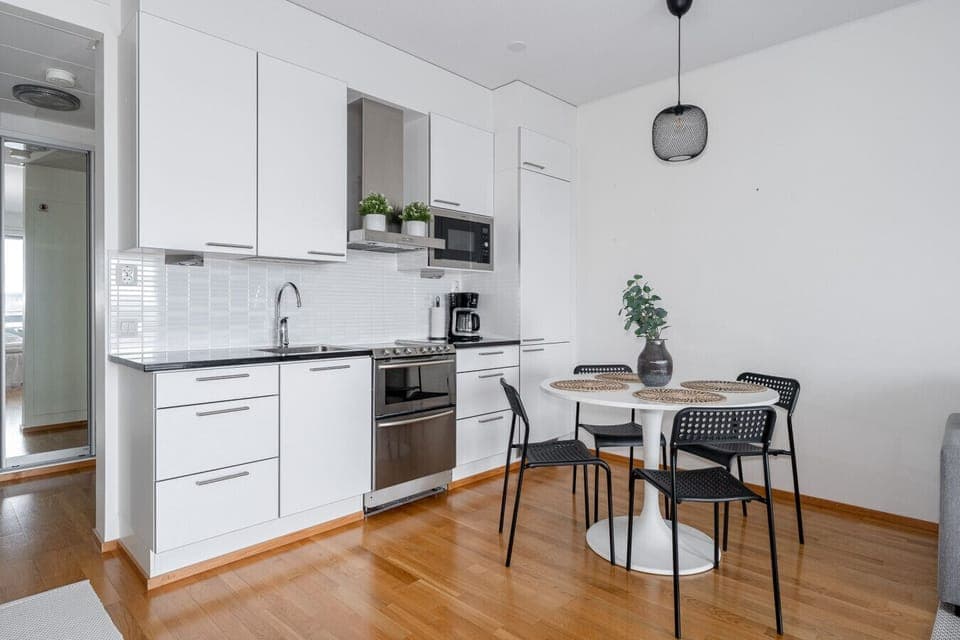 Kitchen is an open concept kitchen equipped with a dishwasher.