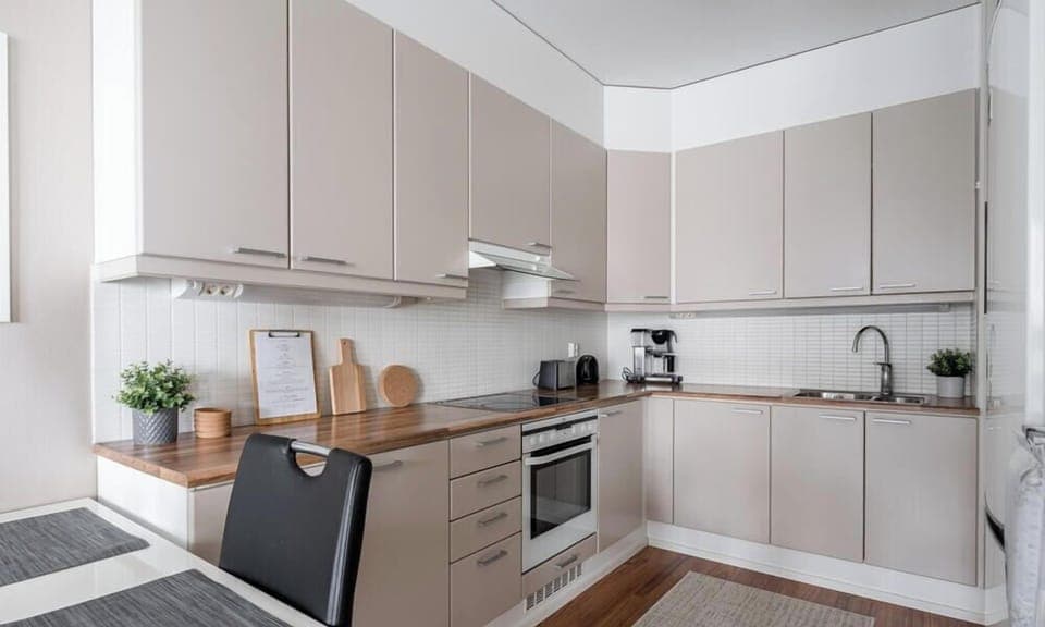 The kitchen is well equipped with cooking ware.