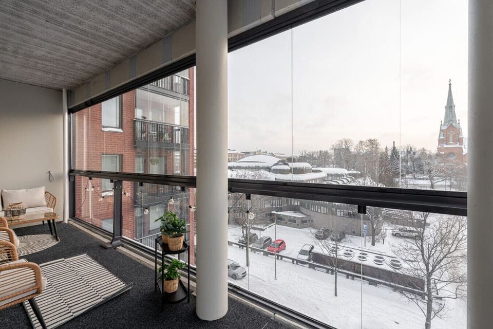Take in the city views from the comfort of the sheltered balcony, no matter the season.