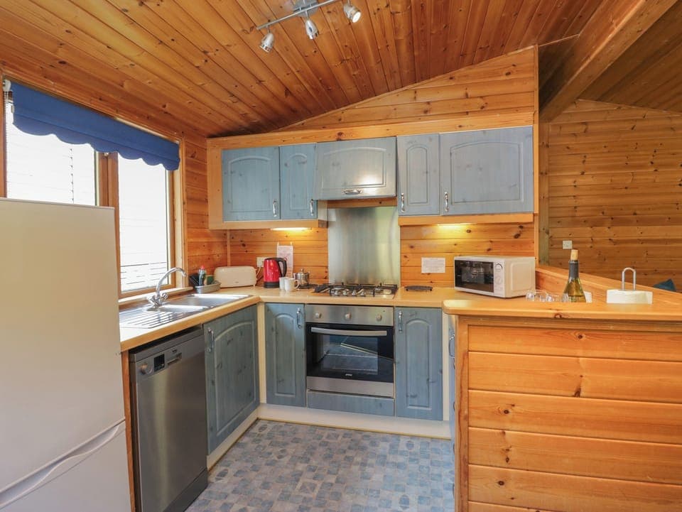 Fridge, dishwasher, electric kettle, cookware/dishes/utensils