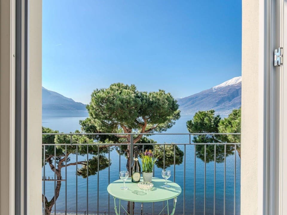 Flooring, Interior Design, Floor, Apartment, Balcony, Ceiling, Condominium, Chair, Shade, Porch