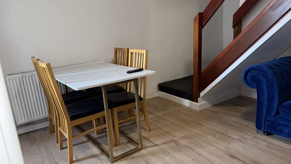 Enjoy meals in the dining area equipped with a table and chairs. Ideal for sharing meals, planning your day, or enjoying a cup of coffee. 