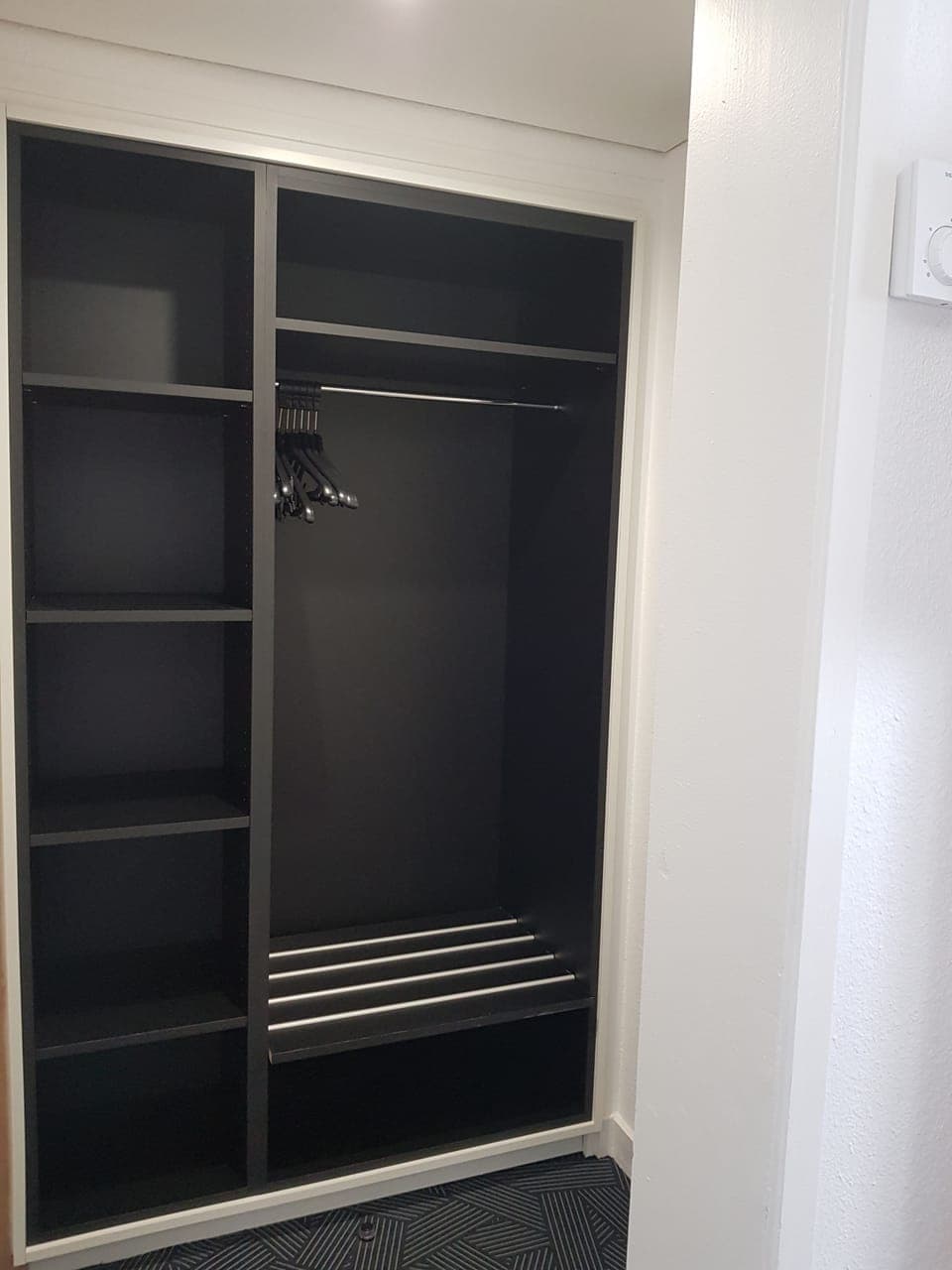 Desk, laptop workspace, blackout drapes, soundproofing