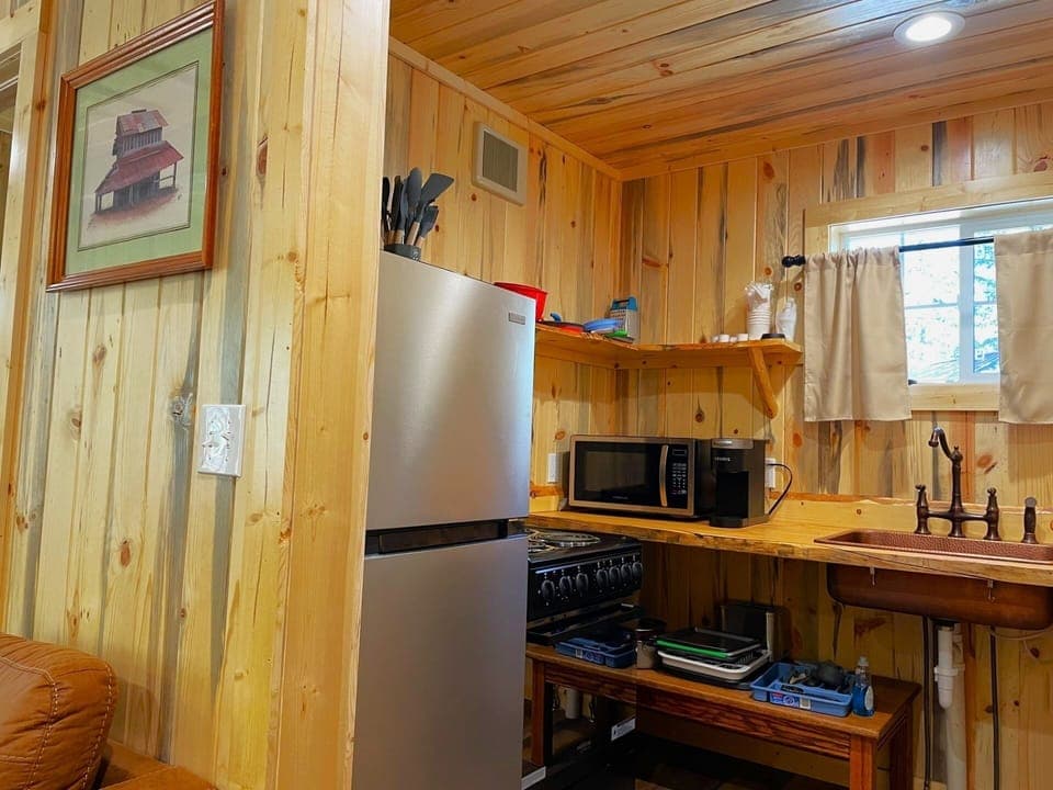 Cook simple meals in the handy kitchenette with full-size fridge.