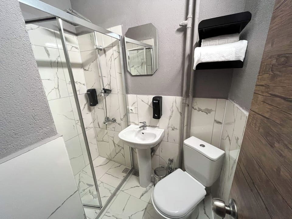 Double or Twin Room | Bathroom | Shower, hair dryer, slippers, towels