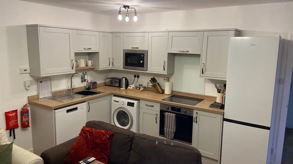 Ice in the freezer, corkscrew in the drawer, cafetiere, espresso pot & teapot