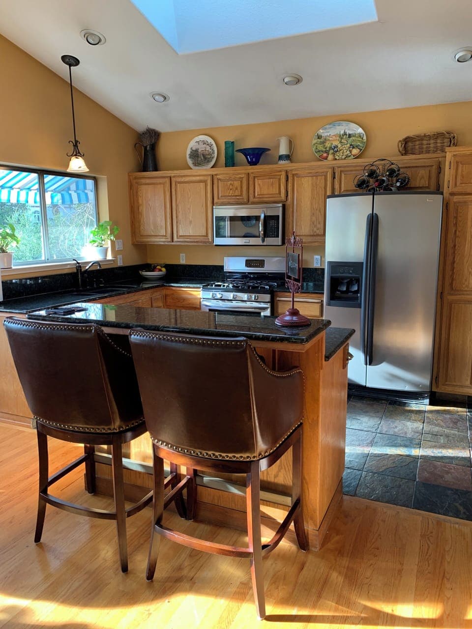 well stocked kitchen with everything you need.