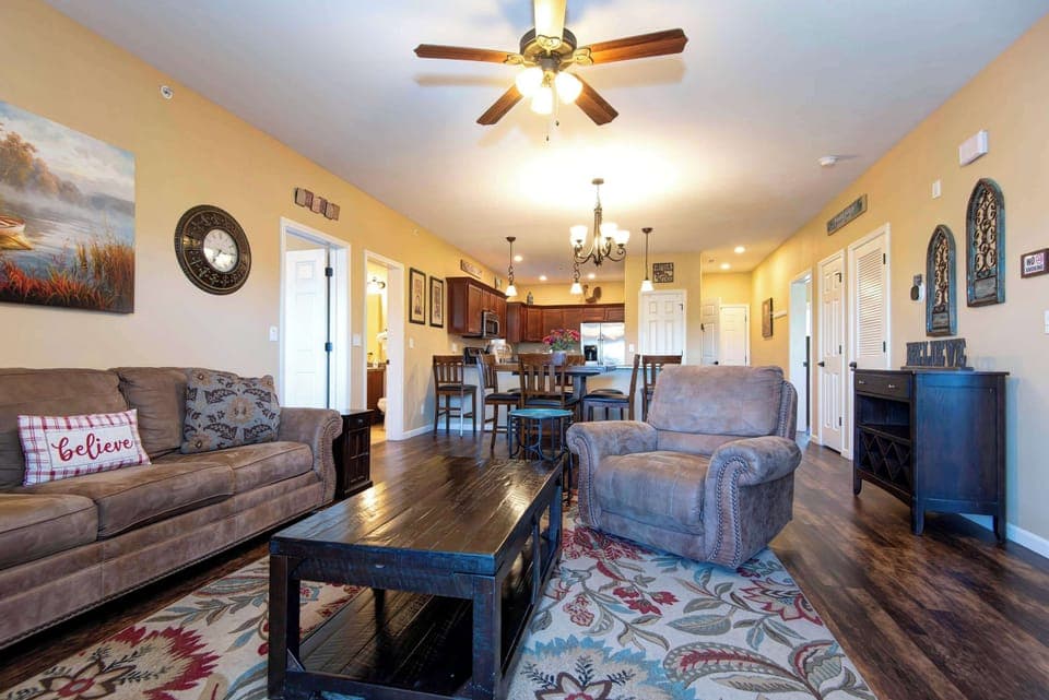 From the living room, enjoy a clear view of the dining area and front entrance highlighting the home's open layout and welcoming flow.