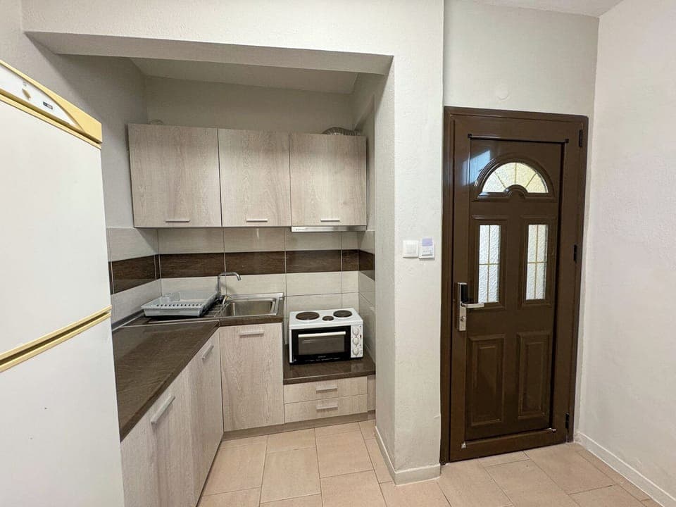Classic Apartment, Courtyard View | Private kitchen | Fridge, stovetop, cookware/dishes/utensils