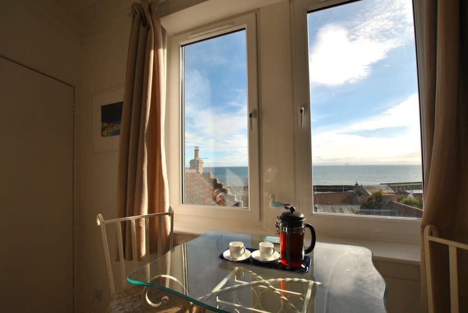 Watch the sun rise and the waves roll in