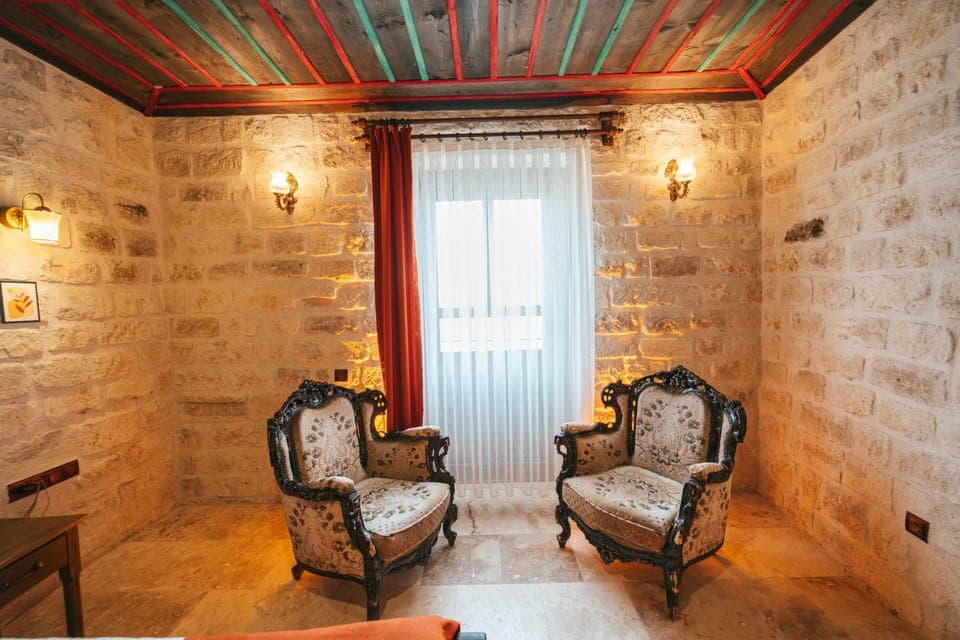 Standard Room, Multiple Beds, Courtyard View | Living area | 50-cm Smart TV with digital channels, heated floors