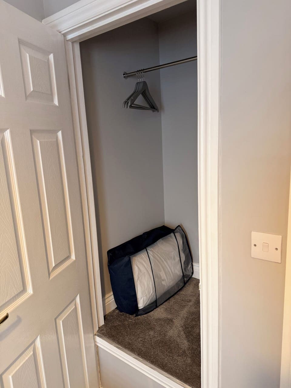 Built in wardrobe in single bed bedroom