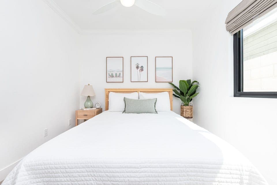 Refresh and recharge in this cozy guest bedroom, thoughtfully styled with soft linens and a comfortable queen bed for a peaceful night’s sleep
                