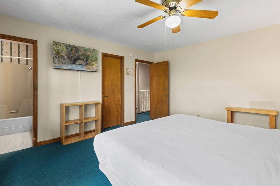 Relax in a bright space featuring a comfy bed and modern amenities!