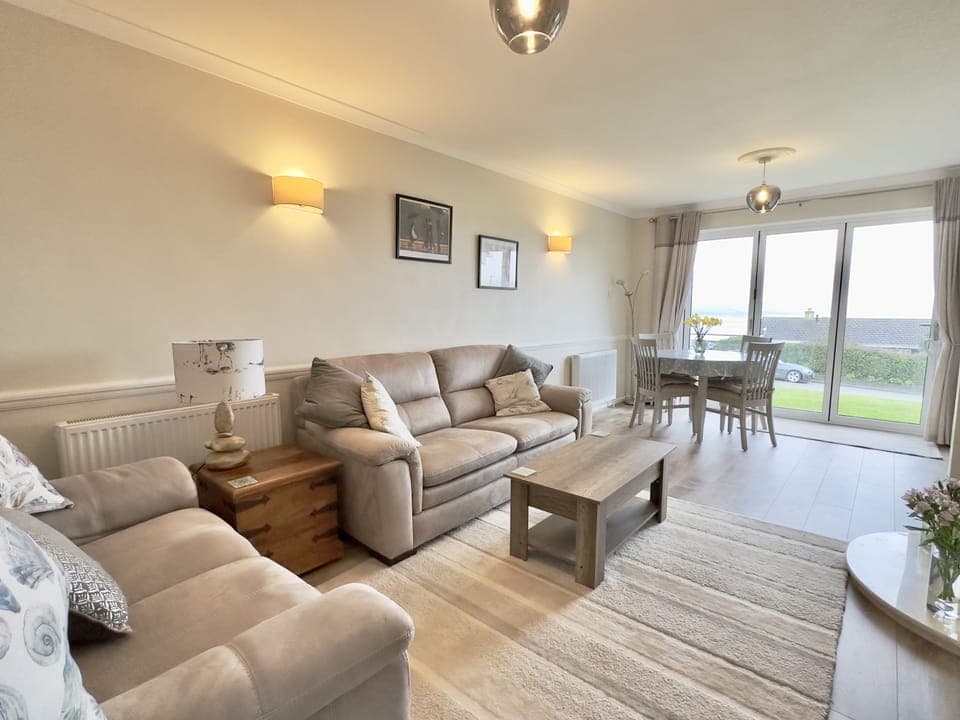 Sofas in the living room of Curlews, 36 Egerton Road Holiday Cottage, Padstow, North Cornwall