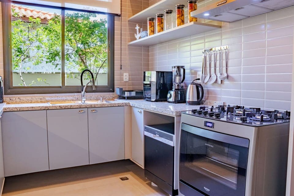 Villa | Private kitchen | Fridge, microwave, oven, stovetop
