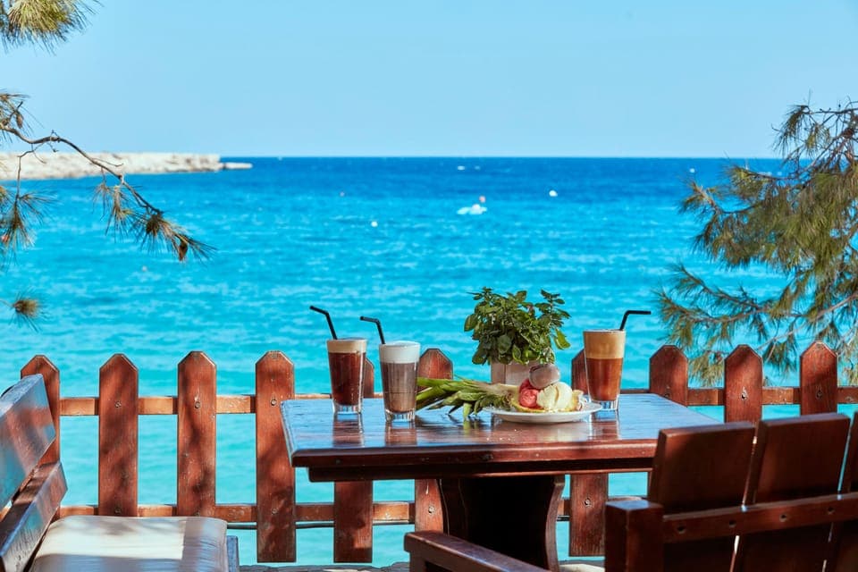 4 bars/lounges, poolside bar, beach bar