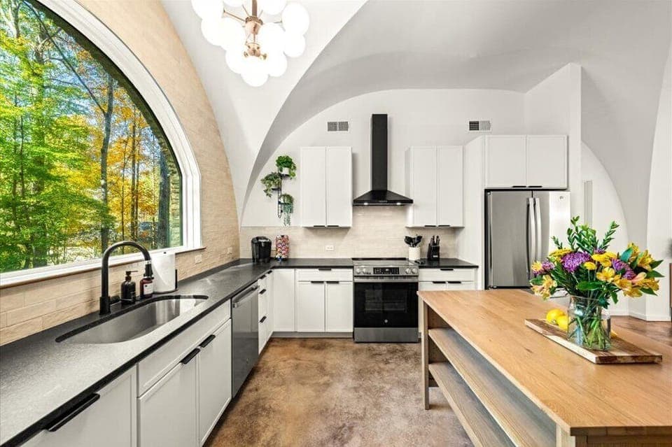 Modern Fully Equipped Kitchen with Bar Seating