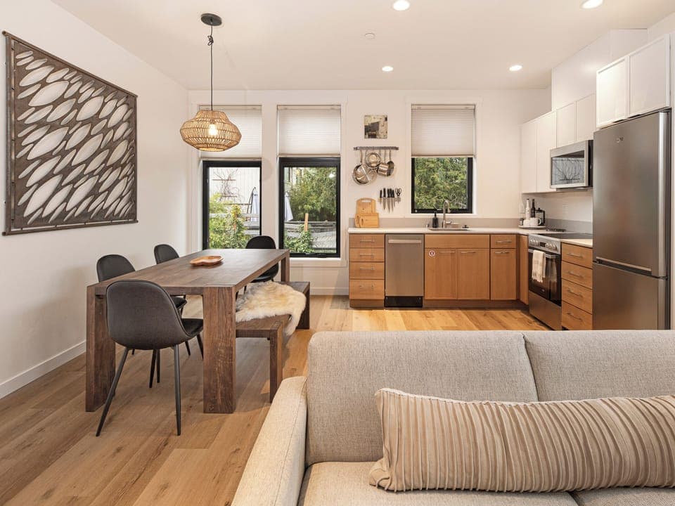 Thoughtfully designed with a gourmet kitchen, stylish modern furnishings, and abundant natural light.