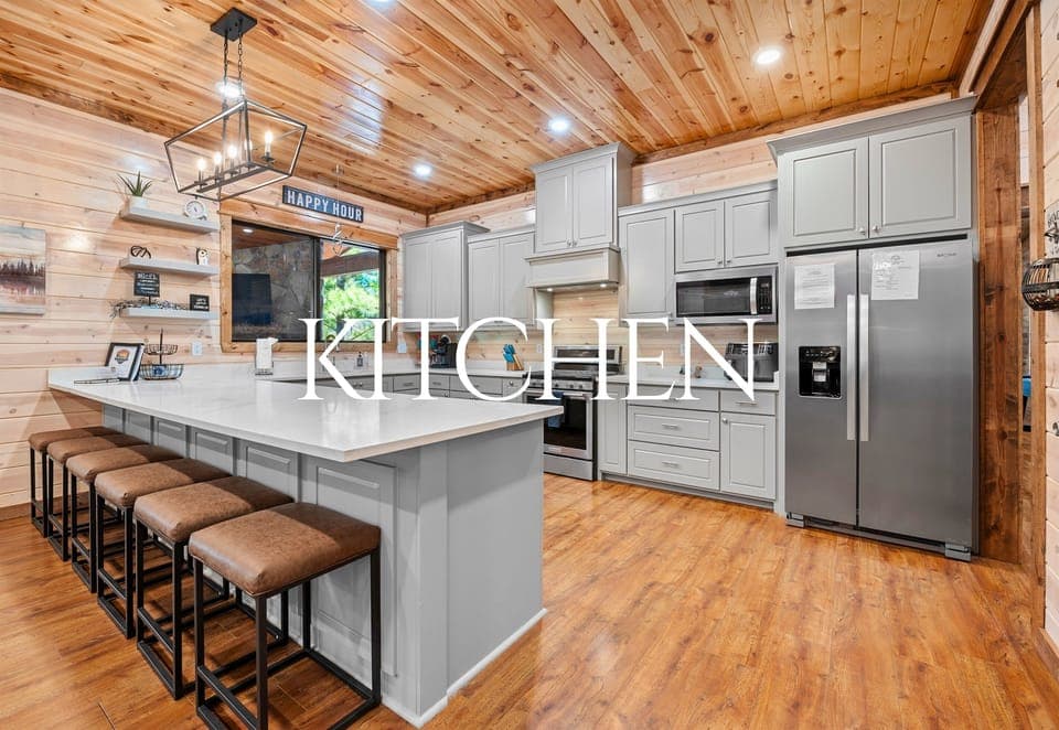 This gorgeous kitchen is a gathering place for laughter, good food, and sharing stories around the oversized island.