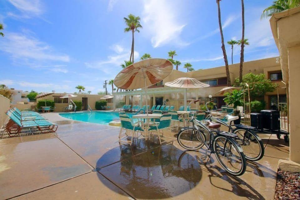 Bask in the sun by the poolside, complete with lounge chairs and shaded seating, creating an ideal space for relaxation and enjoyment amidst the serene desert backdrop.