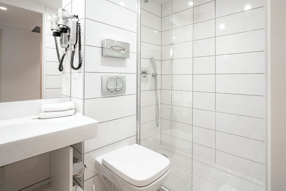 Shower, eco-friendly toiletries, hair dryer, towels