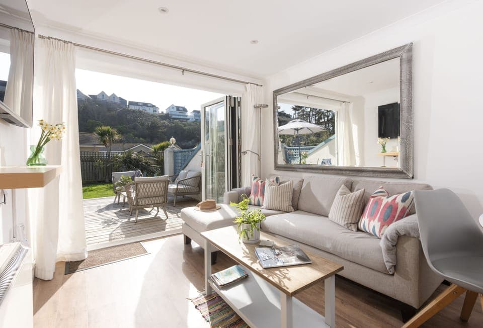 Bluebirds is a charming two-bedroom holiday home perfectly positioned just fifty metres from Polzeath Beach