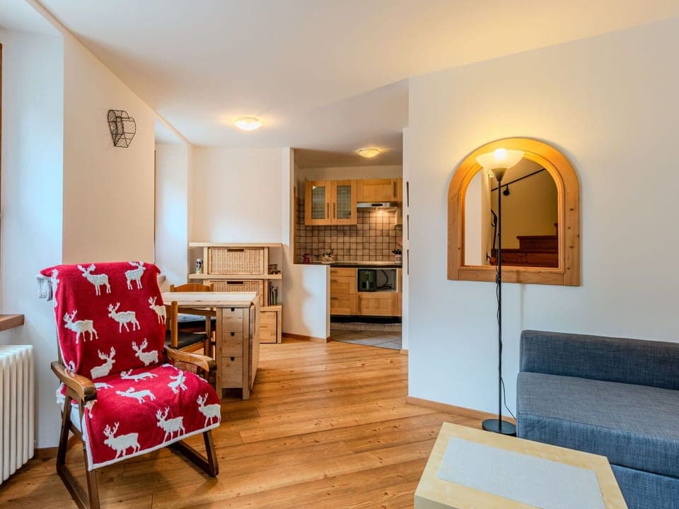 Furniture, Interior Design, Wood, Flooring, Ceiling, Floor, Room, Lighting, Living Room, Chair