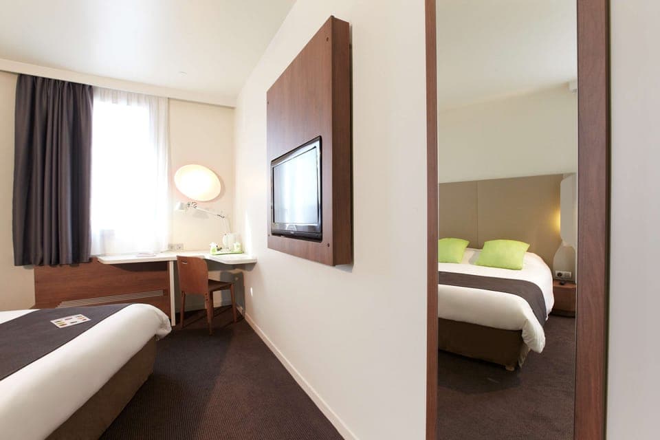 Premium bedding, desk, blackout drapes, iron/ironing board