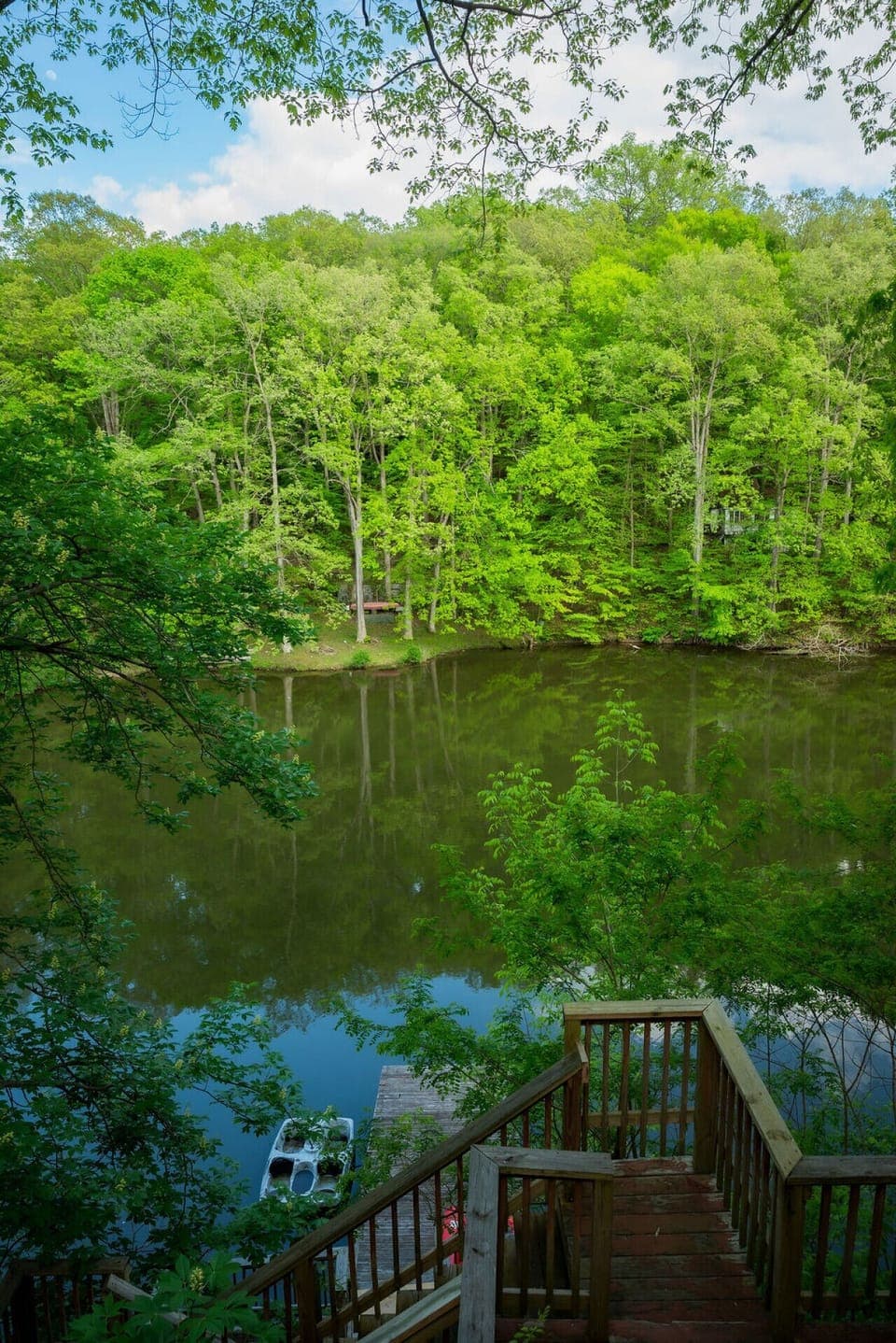 Wake up to shimmering water just steps from your deck- your front-row seat to peaceful lake mornings and golden sunsets.