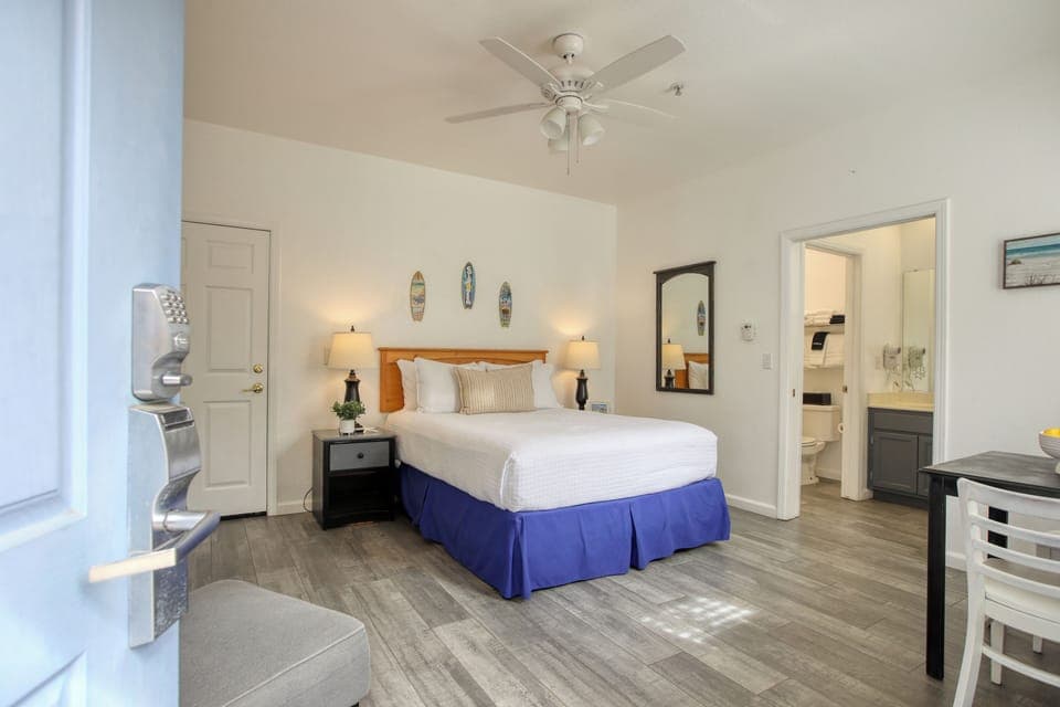 Welcome to The Shark Shack, Unit 303! This cozy downstairs studio features a comfy queen bed and a compact kitchenette—perfect for your seaside escape.