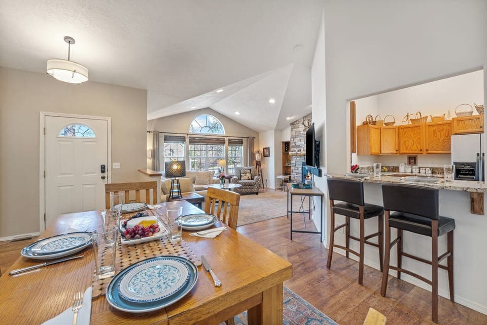 Dining area with seating for 4 and bar seating