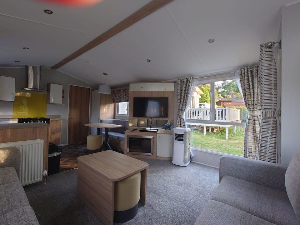 Comfort Mobile Home, 2 Bedrooms, Non Smoking, Lake View | Living area | 40-inch LCD TV with digital channels, Netflix, DVD player