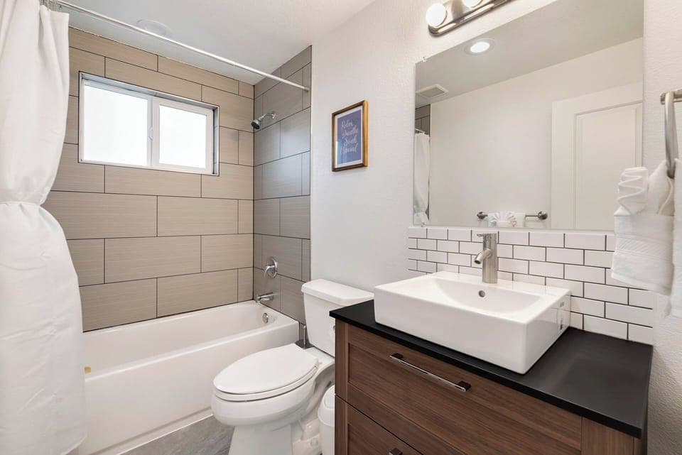 Townhome, Multiple Beds, Patio, Garden View | Bathroom | Hair dryer, towels