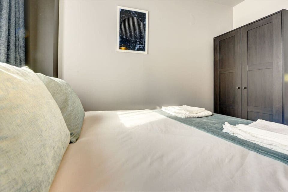 Bedroom 2 has a large wardrobe.